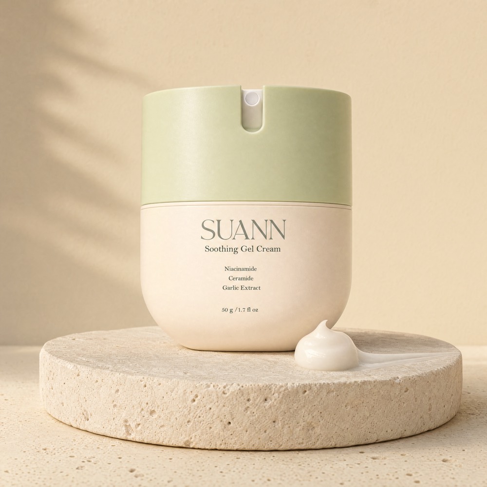 SUANN Soothing Gel Cream jar on a travertine pedestal