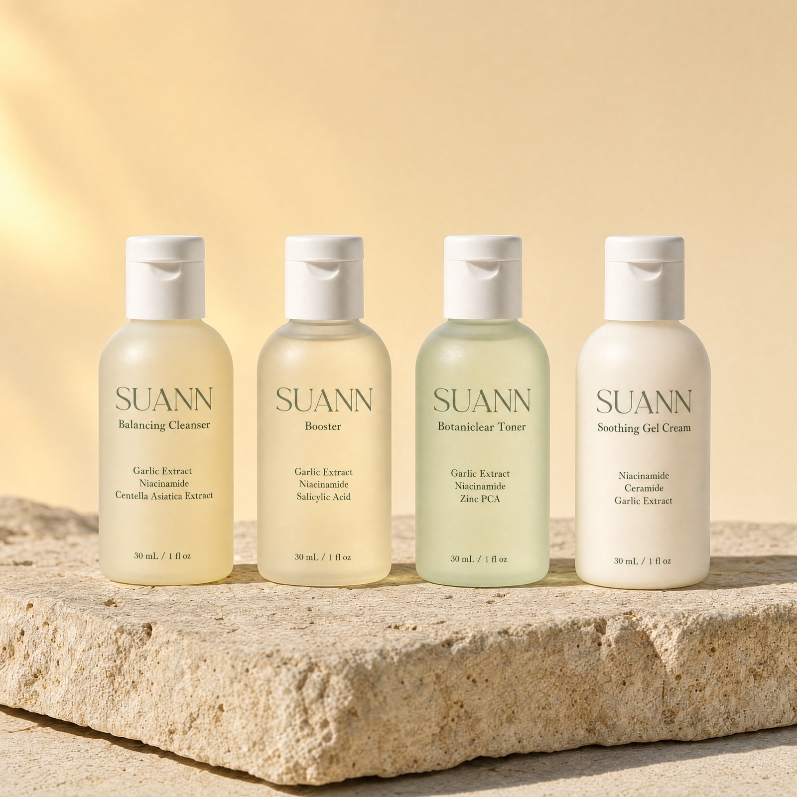SUANN Trial Kit — four 30 mL minis lined up on a stone slab